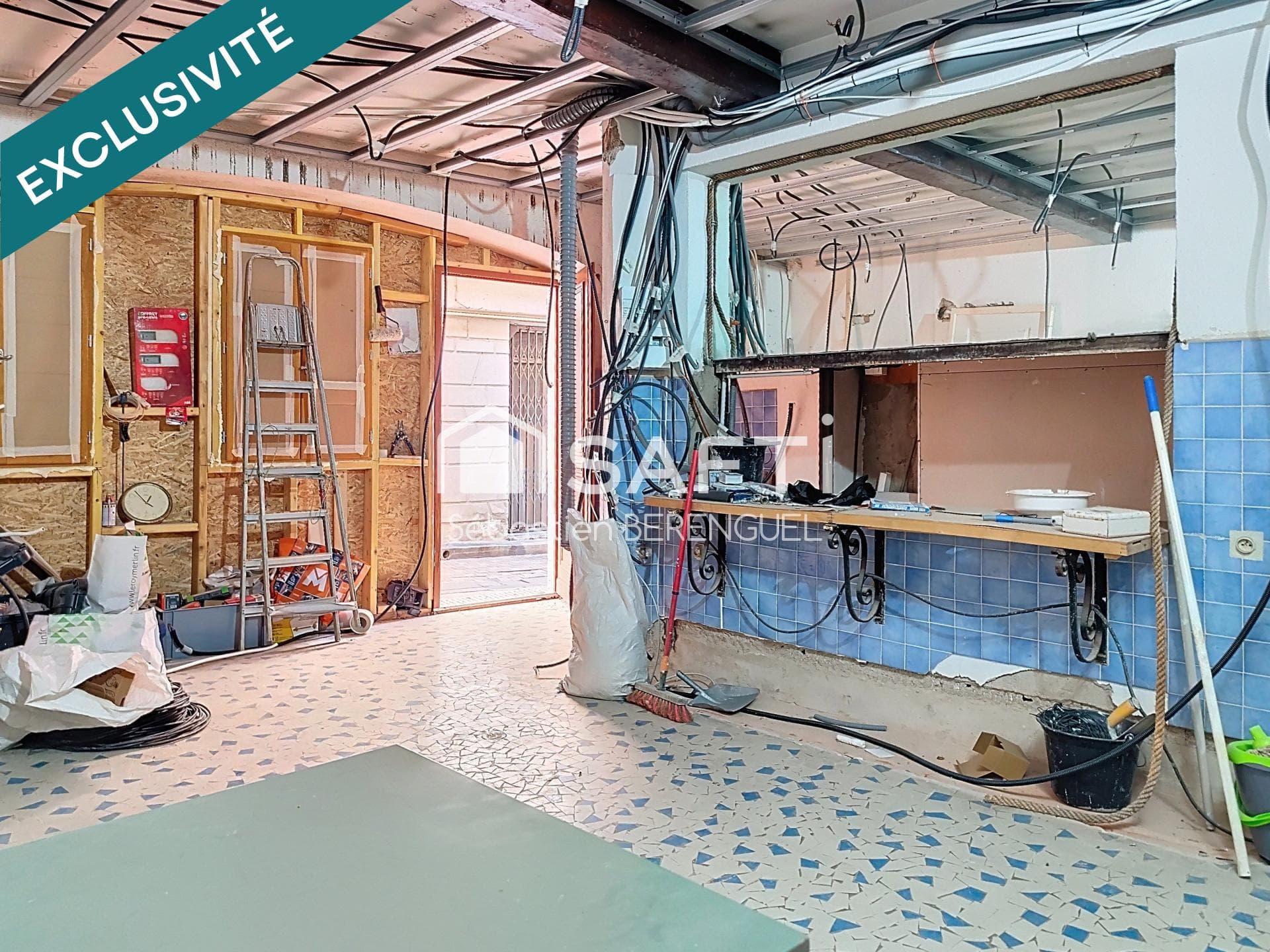 Appartement plateau à rénover entièrement dans maison de ville idéal investisseur