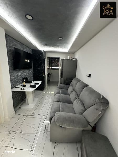 Apartament de vanzare 3 camere Etaj Parter 50Mp Ostroveni Rm Valcea