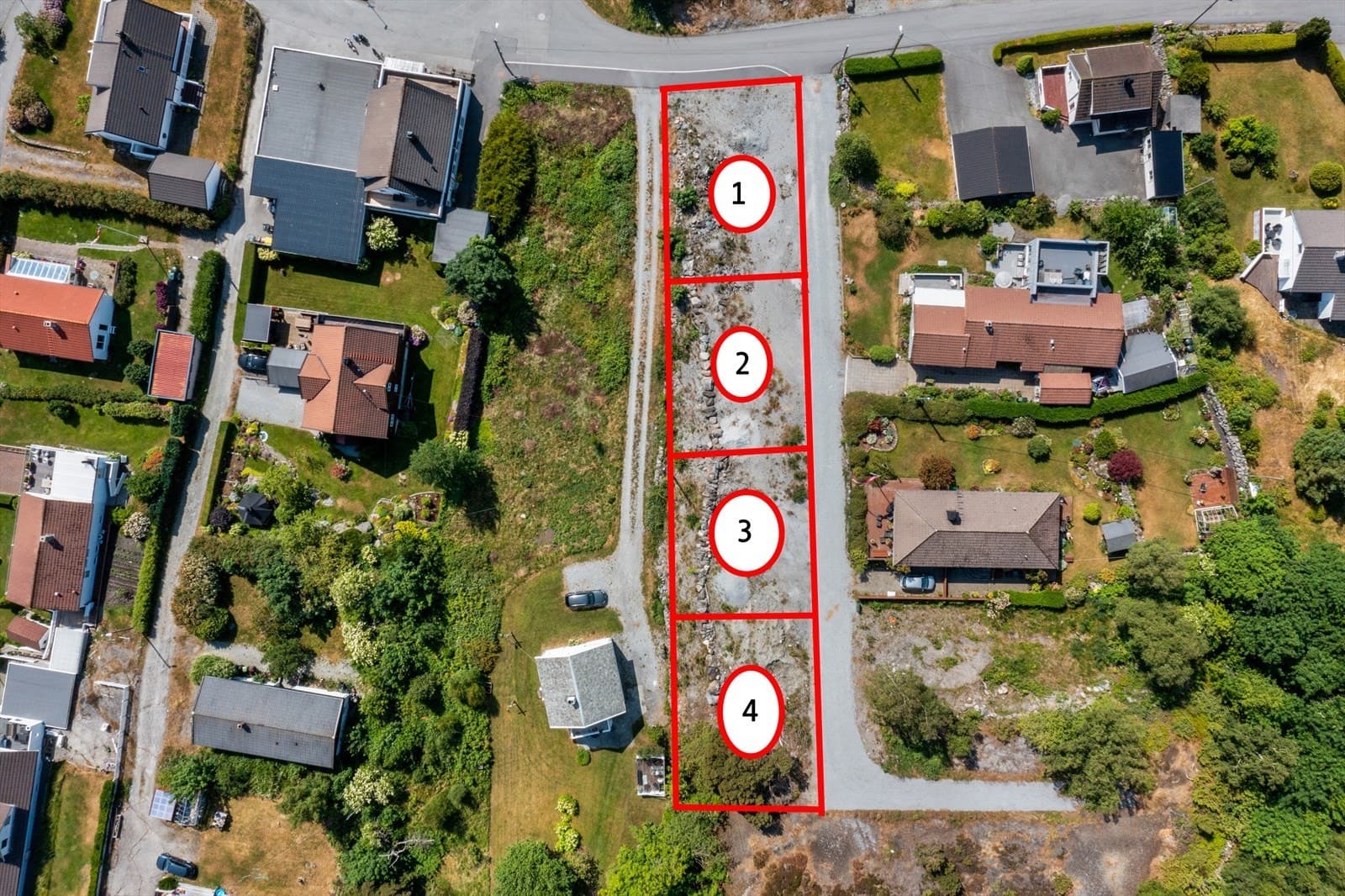 EiendomsMegler 1 Stavanger Byggeklar hjørnetomt - Strøm, vann og kloakk ligger klart til tomtegrense - Ingen byggeklausul Norstrandveien Tomt 1, Vassøy