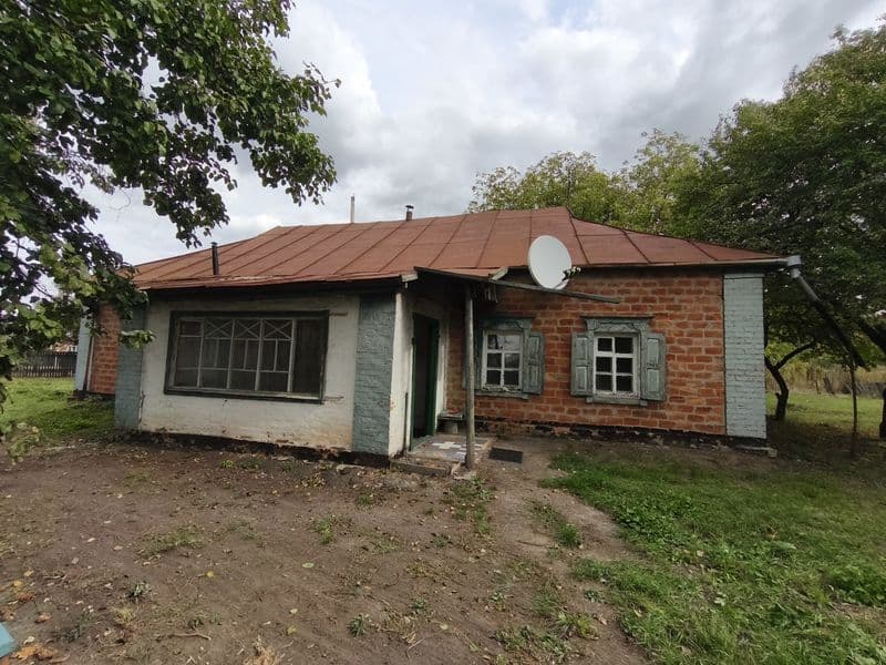 Земельна ділянка з будинком