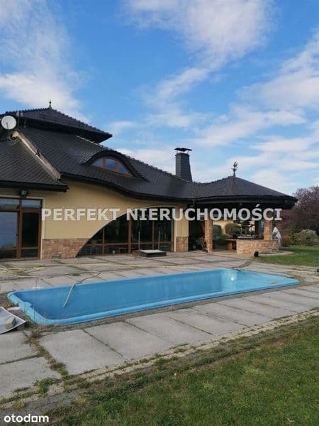 Rezydencja z basenem ,7 pokoi , działka 2000m2