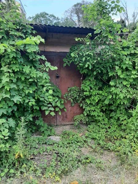 Цегляний гараж без ями