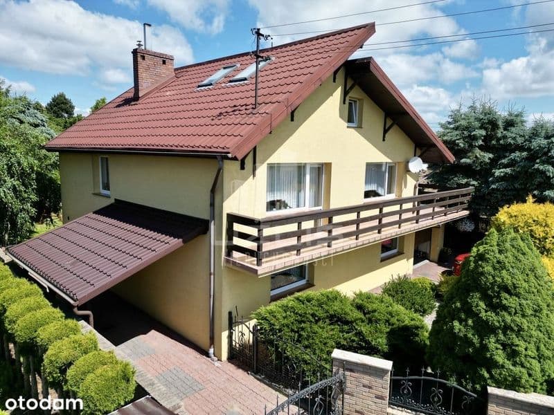 Solidny dom z garażem i budynkiem gospodarczym