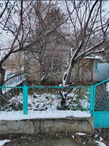 Нежитлова будівля 100,7 кв.м. (гараж Б,В, вбиральня Г, споруди №1-5)