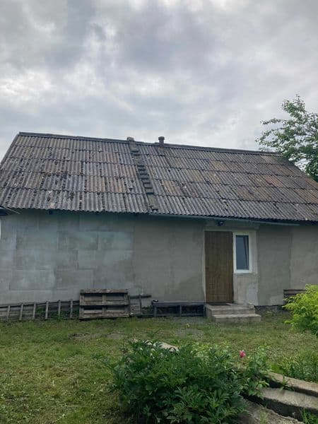 Земельна ділянка з приватним будинком