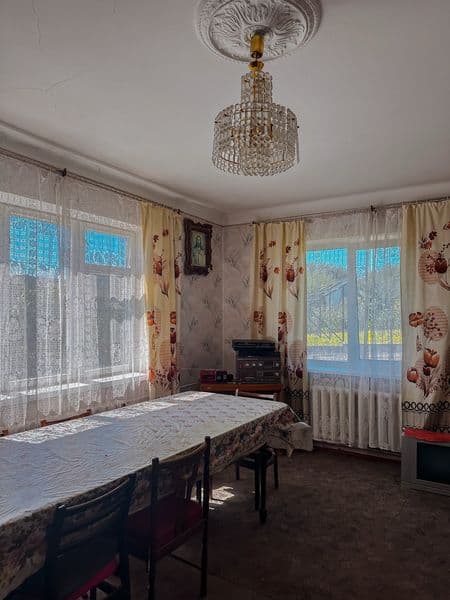 Продаж половини будинку з окремою приватизованою землею в районі Червоних Гір. Вул.Рівненська