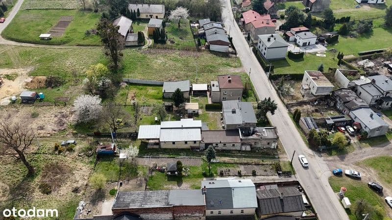 Dom z zabudową gospodarczą i warsztatem