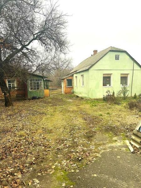 Люботин, центр міста, 24 сотки,  два будинки на ділянці, гараж, сад.