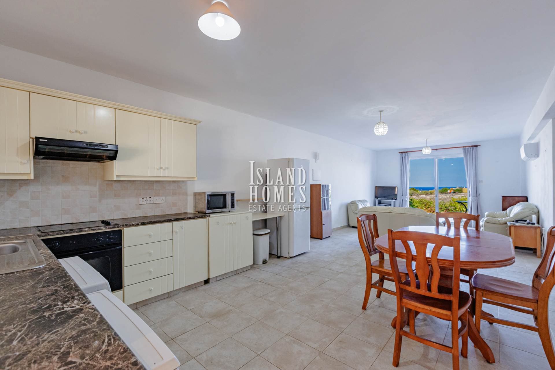 2 bedroom, 1 bathroom, ground floor apartment with COMMUNAL SWIMMING POOL, SEA VIEW and TITLE DEEDS with notes on application, in convenient area of Kapparis - CVK107